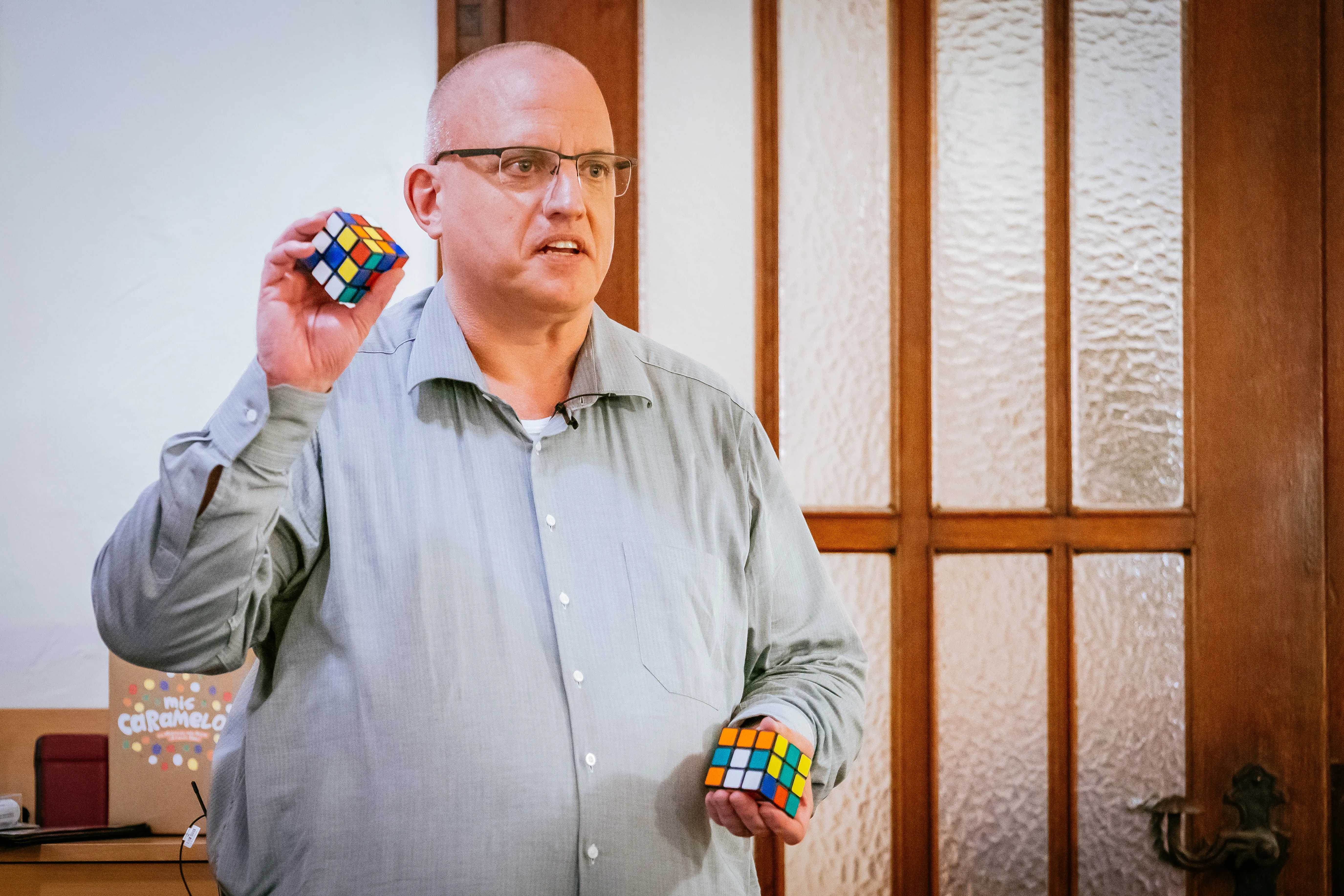 Portrait with two puzzle cubes